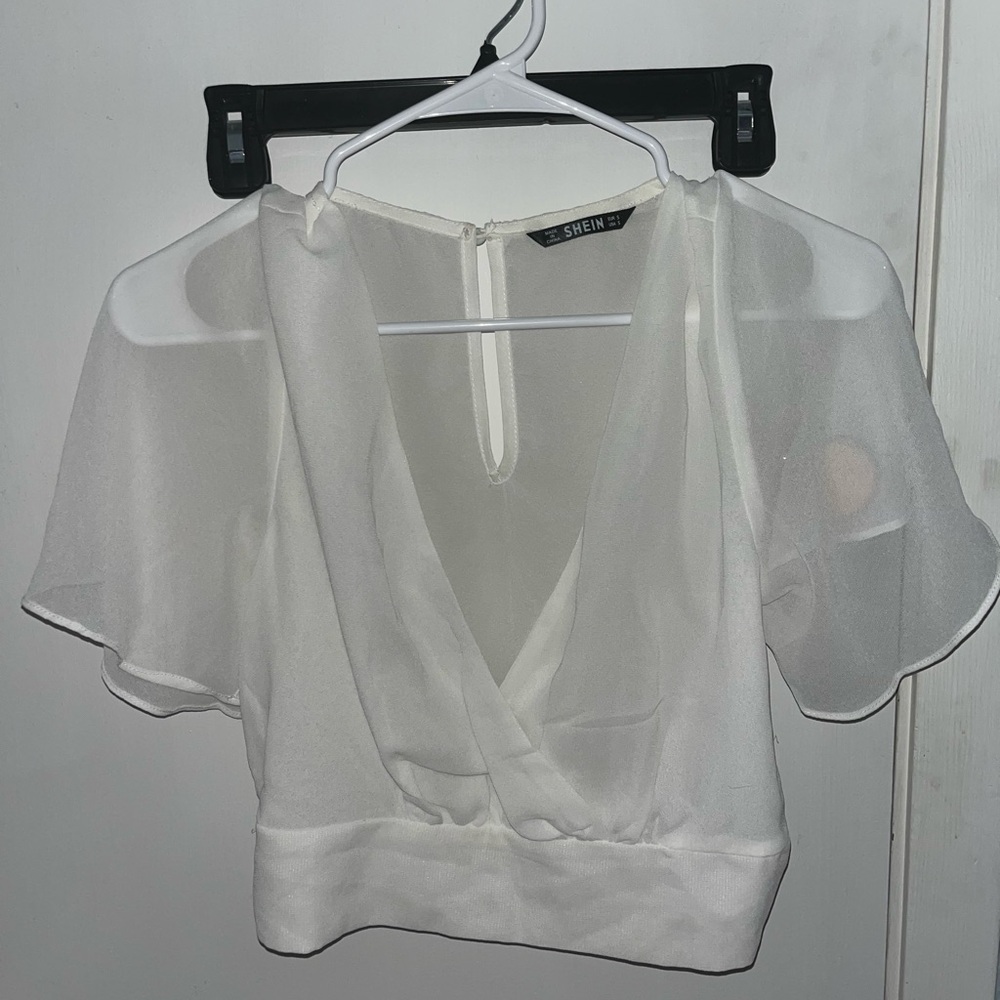 See-through blouse with flowy sleeves